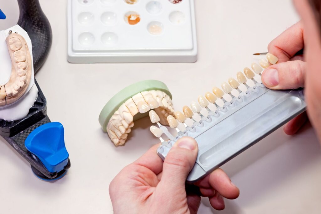 Artificial Teeth on White Table.